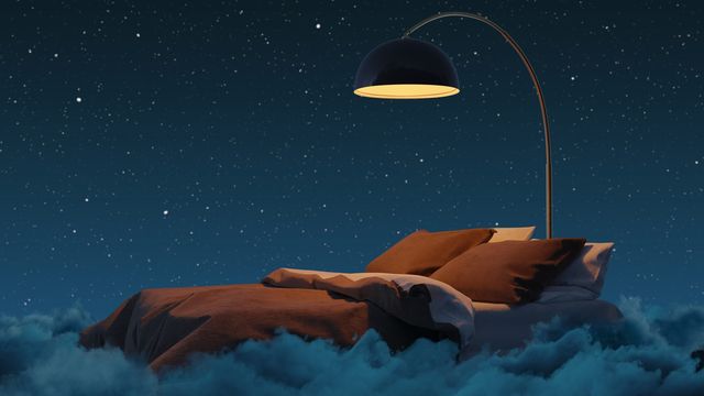 A bed floating on clouds with a lamp hanging over.