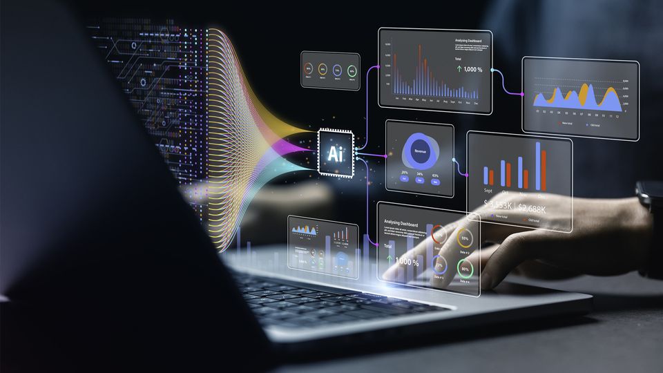 Data and AI symbols floating above a laptop.