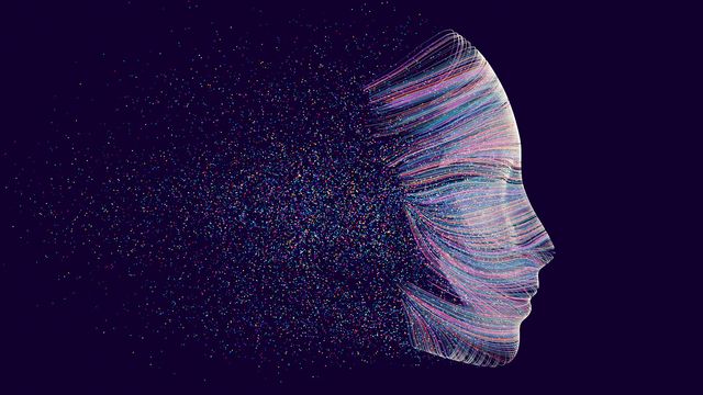 An image depicting artificial intelligence. A robotic-looking face disappears into small pieces. 